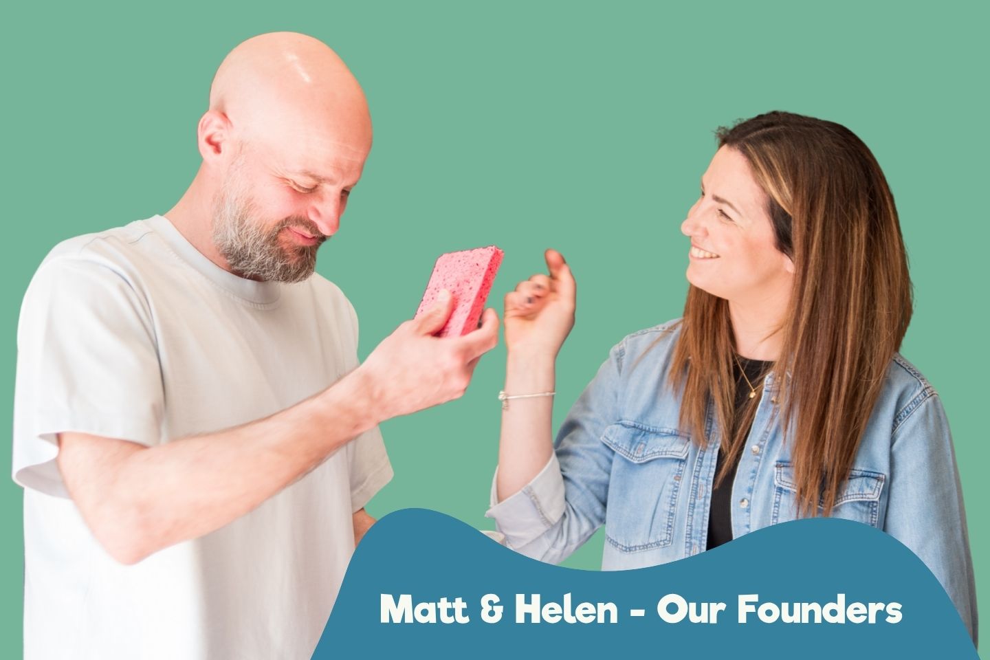 Composty founders smiling and holding a pink compostable sponge, representing the family-run eco brand.